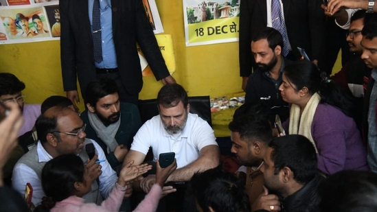 Congress leader Rahul Gandhi listens to protestors during a dharna to protest against alleged paper leak and irregularities in the BPSC 70th Integrated Combined Competitive Examination (CCE) 2024 at Gardanibag, in Patna.(Santosh Kumar)