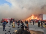 Mahakumbh fire: The fire broke out in Sector 19 of Mahakumbh tent city due to a suspected cylinder blast in one of the camps.(HT photo) Mahakumbh fire: The fire broke out in Sector 19 of Mahakumbh tent city due to a suspected cylinder blast in one of the camps.(HT photo)