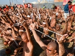 Prayagraj: Newly-initiated Naga Sadhus of Shri Panchayati Akhara Niranjani perform rituals during Mahakumbh, at Sangam in Prayagraj, Sudnay, Jan. 19, 2025. (PTI Photo) (PTI01_19_2025_000372A)(PTI) Prayagraj: Newly-initiated Naga Sadhus of Shri Panchayati Akhara Niranjani perform rituals during Mahakumbh, at Sangam in Prayagraj, Sudnay, Jan. 19, 2025. (PTI Photo) (PTI01_19_2025_000372A)(PTI)