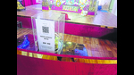 QR code pasted atop a donation box in the temple of Lord Jagannath at Sector 19 of the mela area. (HT) QR code pasted atop a donation box in the temple of Lord Jagannath at Sector 19 of the mela area. (HT)
