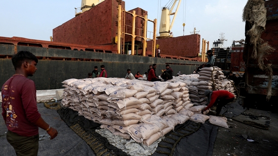 FILE PHOTO: A worker arranges sugar bags in a net to load them onto a cargo ship at the Deendayal Port in Kandla, in the western state of Gujarat, India, September 25, 2024. REUTERS/Amit Dave/File Photo (REUTERS)(HT_PRINT) FILE PHOTO: A worker arranges sugar bags in a net to load them onto a cargo ship at the Deendayal Port in Kandla, in the western state of Gujarat, India, September 25, 2024. REUTERS/Amit Dave/File Photo (REUTERS)(HT_PRINT)