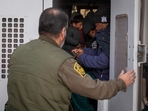 Immigrants prepare to be transported by the US Border Patrol after crossing the US-Mexico border on January 20, 2025 near Sasabe, Arizona. (Getty Images via AFP) Immigrants prepare to be transported by the US Border Patrol after crossing the US-Mexico border on January 20, 2025 near Sasabe, Arizona. (Getty Images via AFP)