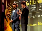 Kartik Aaryan and Shah Rukh Khan attended an IIFA event in Mumbai. Kartik Aaryan and Shah Rukh Khan attended an IIFA event in Mumbai.
