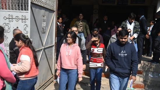 Candidates coming out after appeared in the Common Management Admission Test (CMAT) exam at an examination centre at Patliputra in Patna. (Santosh Kumar )