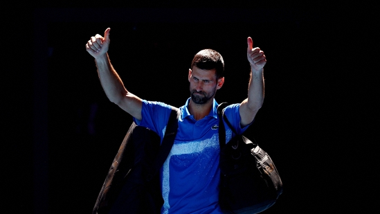 Serbia's Novak Djokovic gestures to the crowd as he leaves the court after retiring from his semi final match against Germany's Alexander Zverev (REUTERS)