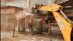 PMRDA cleared over 120 unauthorised structures covering more than 15,000 square feet by Thursday afternoon. (HT) PMRDA cleared over 120 unauthorised structures covering more than 15,000 square feet by Thursday afternoon. (HT)