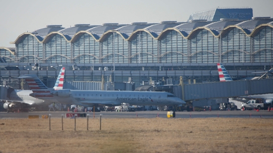  A plane takes off from Reagan National Airport after the crash of an American Airlines plane on the Potomac River the previous night as it approached the airport on January 30, 2025, in Arlington, Virginia. The American Airlines flight from Wichita, Kansas, collided mid-air with a military Black Hawk helicopter while on approach to Ronald Reagan Washington National Airport. According to reports, there were no survivors among the 67 people on both aircraft.( AFP)