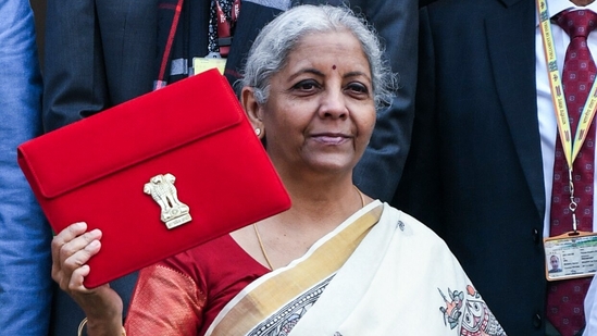 Union Finance Minister Nirmala Sitharaman shows the Budget Tablet as she arrives at Parliament House to present the Union Budget 2025.(ANI) Union Finance Minister Nirmala Sitharaman shows the Budget Tablet as she arrives at Parliament House to present the Union Budget 2025.(ANI)