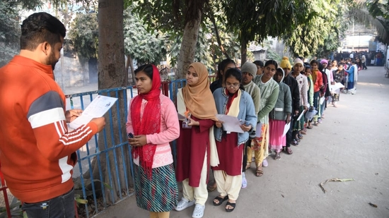 Aspirants show their documents before appearing in the Class 12 (intermediate) exam of the Bihar School Examination Board (BSEB) at D.A.V High School Danapur in Patna(Santosh Kumar)