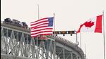 The US and Canadian flags fly on the US side of the St. Clair River near the Bluewater Bridge border crossing between Sarnia, Ontario and Port Huron, Michigan on January 29. (AFP) The US and Canadian flags fly on the US side of the St. Clair River near the Bluewater Bridge border crossing between Sarnia, Ontario and Port Huron, Michigan on January 29. (AFP)
