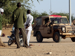(FILES) Chadians look at French military vehicles driving on a trail near Abeche (Eastern Chad), 15 November 2007. The French army partols and secures the western part of Darfur border in Chad. European Union will send soon almost 4,300 soldiers to secure the refugees camps in Chad where around 400,000 refugees and displaced Chadians are gathered. Chad announced on November 28, 2024 that it was ending military cooperation with former colonial power France, just hours after a visit by French Foreign Minister Jean-Noel Barrot. Chad is a key link in France's military presence in Africa, constituting Paris's last foothold in the Sahel after the forced withdrawal of its troops from Mali, Burkina Faso and Niger. (Photo by Thomas COEX / AFP)(AFP) (FILES) Chadians look at French military vehicles driving on a trail near Abeche (Eastern Chad), 15 November 2007. The French army partols and secures the western part of Darfur border in Chad. European Union will send soon almost 4,300 soldiers to secure the refugees camps in Chad where around 400,000 refugees and displaced Chadians are gathered. Chad announced on November 28, 2024 that it was ending military cooperation with former colonial power France, just hours after a visit by French Foreign Minister Jean-Noel Barrot. Chad is a key link in France's military presence in Africa, constituting Paris's last foothold in the Sahel after the forced withdrawal of its troops from Mali, Burkina Faso and Niger. (Photo by Thomas COEX / AFP)(AFP)