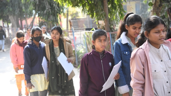 Students come out after appearing in the Class 12 (intermediate) exam of the Bihar School Examination Board (BSEB) at D.A.V high school at Danapur, Patna.(Santosh Kumar)