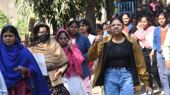 Candidates come out of the examination centre in Patna after the conclusion of exam. (Santosh Kumar)