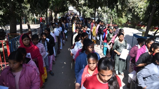 Outside D.A.V high school danapur in Patna where students are standing in queue before appearing for BSEB 12th exam. (Santosh Kumar )