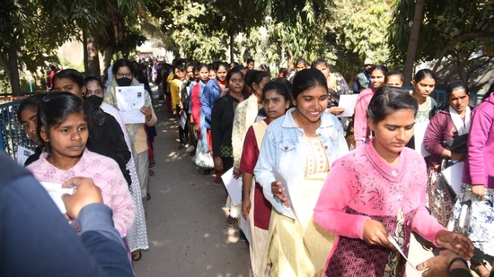 Students in queue before appearing in the Class 12 (intermediate) exam of the Bihar School Examination Board (BSEB) at D.A.V high school danapur in Patna (Santosh Kumar )