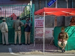 Delhi police personnel seen outside a strongroom polling station in Gole Market in New Delhi on Friday. (RAJ K RAJ /HT PHOTO) Delhi police personnel seen outside a strongroom polling station in Gole Market in New Delhi on Friday. (RAJ K RAJ /HT PHOTO)