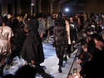 Models shine in Siriano's glamorous collection inspired by cars at New York Fashion Week. (AFP) Models shine in Siriano's glamorous collection inspired by cars at New York Fashion Week. (AFP)