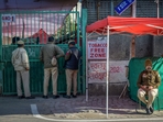 Delhi police personnel seen outside a strongroom polling station in Gole Market. in New Delhi, on Friday. (RAJ K RAJ /HT PHOTO) Delhi police personnel seen outside a strongroom polling station in Gole Market. in New Delhi, on Friday. (RAJ K RAJ /HT PHOTO)