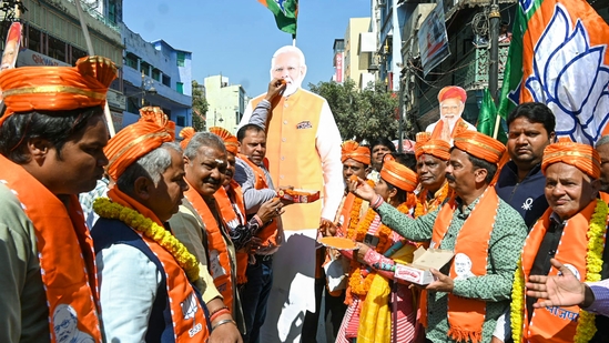 BJP workers celebrate the party's victory in the Delhi Assembly election and UP's Milkipur by-election, in Varanasi, Saturday, Feb. 8, 2025. BJP workers celebrate the party's victory in the Delhi Assembly election and UP's Milkipur by-election, in Varanasi, Saturday, Feb. 8, 2025.