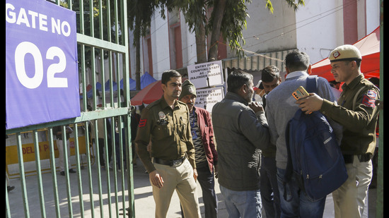 Security checks at a counting centre in New Delhi. (PTI) Security checks at a counting centre in New Delhi. (PTI)