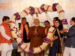 Prime Minister Narendra Modi being garlanded by BJP MPs Manoj Tiwari, Ramvir Singh Bidhuri and Bansuri Swaraj during celebrations at the BJP HQ after the party won the Delhi Assembly election, in New Delhi, Saturday.(PTI) Prime Minister Narendra Modi being garlanded by BJP MPs Manoj Tiwari, Ramvir Singh Bidhuri and Bansuri Swaraj during celebrations at the BJP HQ after the party won the Delhi Assembly election, in New Delhi, Saturday.(PTI)
