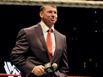 Vince McMahon speaks to an audience during a WWE fan appreciation event(AP) Vince McMahon speaks to an audience during a WWE fan appreciation event(AP)