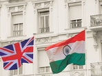UK Great Britain and India national flag waving in the wind from flagpoles in front of a white mansion. (Shutterstock) UK Great Britain and India national flag waving in the wind from flagpoles in front of a white mansion. (Shutterstock)