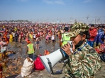 A security personnel makes announcements to manage the rush of devotees during the ongoing Mahakumbh Mela 2025, in Prayagraj, Uttar Pradesh, Saturday.(PTI) A security personnel makes announcements to manage the rush of devotees during the ongoing Mahakumbh Mela 2025, in Prayagraj, Uttar Pradesh, Saturday.(PTI)