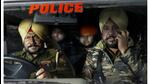 Indians deported from the US being escorted by the police as they leave the airport upon their arrival, in Amritsar, early Sunday. (PTI) Indians deported from the US being escorted by the police as they leave the airport upon their arrival, in Amritsar, early Sunday. (PTI)