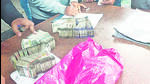 Relative of a victim being handed over ex-gratia relief in cash and getting other formalities done after the stampede. (HT Photo) Relative of a victim being handed over ex-gratia relief in cash and getting other formalities done after the stampede. (HT Photo)