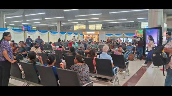 Passengers pack the lobby at Prayagraj airport on Monday (HT Photo) Passengers pack the lobby at Prayagraj airport on Monday (HT Photo)