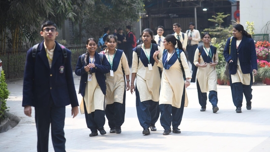 Students coming out after appearing for the Indian Certificate of Secondary Education (ICSE) Class 10th English examination at St. Xavier's High School in Patna.(Santosh Kumar)