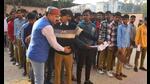 Students being checked before appearing in their UP Board exam at a centre in Pratapgarh on Feb 24. (Sourced) Students being checked before appearing in their UP Board exam at a centre in Pratapgarh on Feb 24. (Sourced)