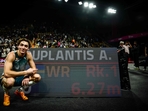 Swedish athlete Armand Duplantis poses next to a screen displaying his record as he celebrates after beating his own world record at 6.27m.(AFP) Swedish athlete Armand Duplantis poses next to a screen displaying his record as he celebrates after beating his own world record at 6.27m.(AFP)