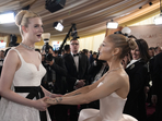 Elle Fanning, left, and Ariana Grande arrive at the Oscars on Sunday.(John Locher/Invision/AP) Elle Fanning, left, and Ariana Grande arrive at the Oscars on Sunday.(John Locher/Invision/AP)