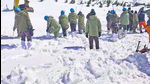 Rescue operation underway after an avalanche hit the Border Roads Organisation (BRO) camp between Mana and Badrinath on Friday, in Chamoli district in Uttarakhand. (PTI) Rescue operation underway after an avalanche hit the Border Roads Organisation (BRO) camp between Mana and Badrinath on Friday, in Chamoli district in Uttarakhand. (PTI)