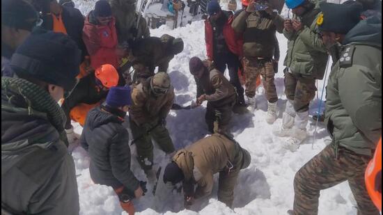 The rescue teams searching for missing workers in the deep snow at the avalanche-hit site near Mana in Uttarakhand’s Chamoli district. The rescue teams searching for missing workers in the deep snow at the avalanche-hit site near Mana in Uttarakhand’s Chamoli district.