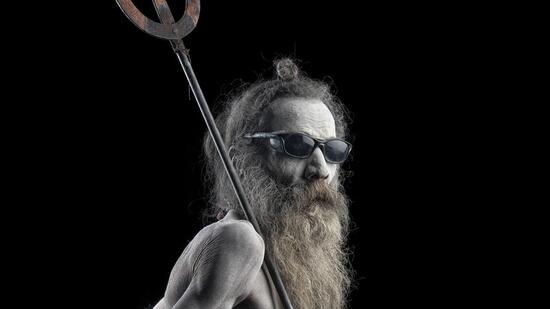 At the opening of the exhibition, standing next to Bandeep was a tall and majestic Naga Sadhu holding a striking silver trishul in his hand. He was Bhupinder Singh from the Niranjani Akhara. (Bandeep Singh) At the opening of the exhibition, standing next to Bandeep was a tall and majestic Naga Sadhu holding a striking silver trishul in his hand. He was Bhupinder Singh from the Niranjani Akhara. (Bandeep Singh)