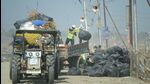 Workers clearing the garbages from the Mela area (Anil Kumar Maurya/HT) Workers clearing the garbages from the Mela area (Anil Kumar Maurya/HT)
