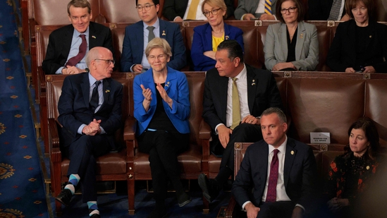 Sen. Elizabeth Warren claps as US President Donald Trump takes ‘Pocahontas’ jibe at her during the joint session of Congress at the US Capitol ( AFP)