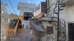 One of the illegal structures built using drug money being demolished at Khanna on Thursday. (HT Photo) One of the illegal structures built using drug money being demolished at Khanna on Thursday. (HT Photo)