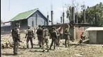 Security personnel stand guard during an indefinite shutdown by the Kuki Zo Council in Manipur. (PTI) Security personnel stand guard during an indefinite shutdown by the Kuki Zo Council in Manipur. (PTI)
