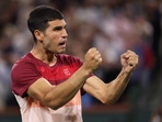 Carlos Alcaraz of Spain celebrates to his team bench after his straight sets victory against Denis Shapovalov of Canada(Getty Images via AFP) Carlos Alcaraz of Spain celebrates to his team bench after his straight sets victory against Denis Shapovalov of Canada(Getty Images via AFP)