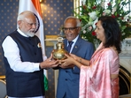 PM Narendra Modi gifts Gangajal water from Maha Kumbh in a brass and copper pot to Mauritius President Dharam Gokhool. PM Narendra Modi gifts Gangajal water from Maha Kumbh in a brass and copper pot to Mauritius President Dharam Gokhool.
