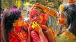 Students of Visva-Bharati University smear colour on each other's faces ahead of Basanta Utsav at Santiniketan in Birbhum district (PTI/ Representative photo) Students of Visva-Bharati University smear colour on each other's faces ahead of Basanta Utsav at Santiniketan in Birbhum district (PTI/ Representative photo)