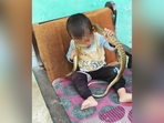 A viral video showed a toddler playing with a snake as an adult filmed instead of intervening.(Instagram/@vivek_choudhary_snake_saver) A viral video showed a toddler playing with a snake as an adult filmed instead of intervening.(Instagram/@vivek_choudhary_snake_saver)