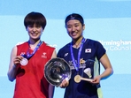 Winner South Korea's An Se Young (R) celebrates with trophy during the podium ceremony after winning against China's Wang Zhi Yi (L) at the end of the Women's Singles Final at the All England Open.(AFP) Winner South Korea's An Se Young (R) celebrates with trophy during the podium ceremony after winning against China's Wang Zhi Yi (L) at the end of the Women's Singles Final at the All England Open.(AFP)