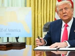 US President Donald Trump speaks as he signs an executive order in the Oval Office of the White House in Washington, DC.(AFP) US President Donald Trump speaks as he signs an executive order in the Oval Office of the White House in Washington, DC.(AFP)