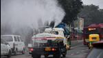 A truck-mounted sprinkler sprays tiny droplets of water to counter air pollution in Delhi. (ANI Photo) A truck-mounted sprinkler sprays tiny droplets of water to counter air pollution in Delhi. (ANI Photo)