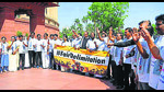 DMK MPs stage a protest on the issue of delimitation, at Parliament House premises in New Delhi on Thursday. (ANI PHOTO) DMK MPs stage a protest on the issue of delimitation, at Parliament House premises in New Delhi on Thursday. (ANI PHOTO)